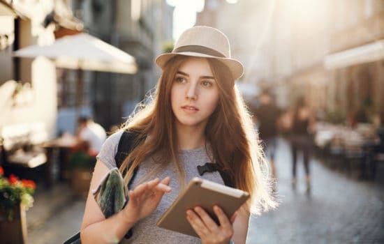 Location Manager taking notes while scouting for locations