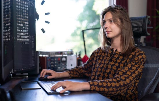 Assistant Editor at her workstation