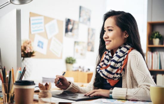 Art director creating a design in her office
