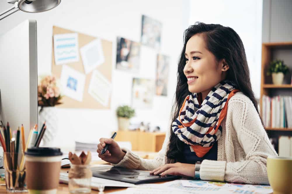 Art director creating a design in her office