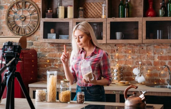 Set dresser decorating a kitchen set