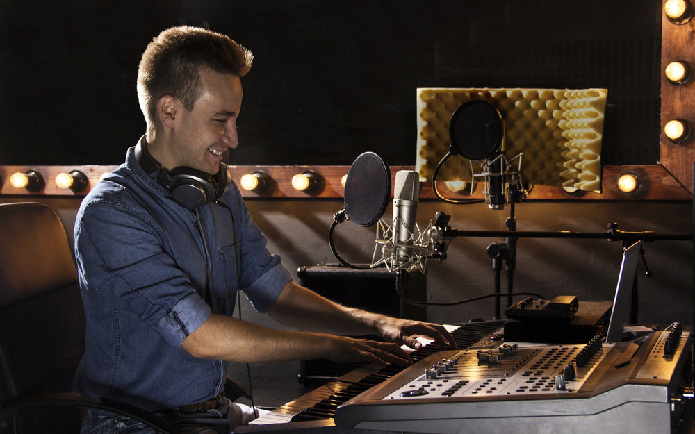 Foley artist in his sound studio
