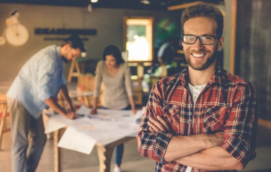 Set Decorator with his team at work in the background