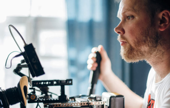 Filmmaking with male Camera Operator on movie set